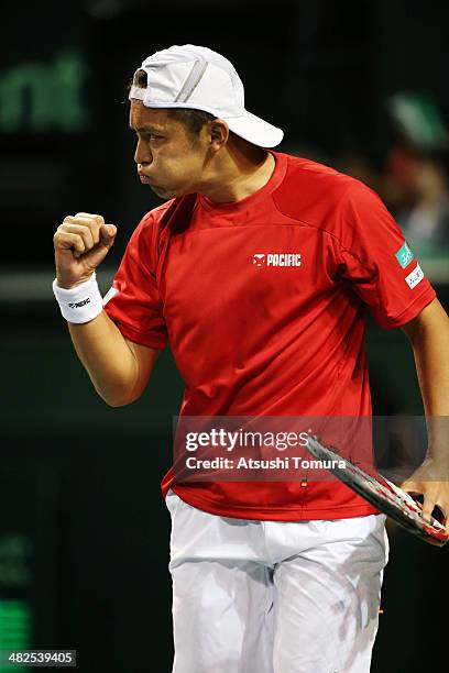 Tatsuma Ito of Japan reacts after scoring a point against Radek Stepanek of Czech Republic in a match between Japan v Czech Republic during the Davis...