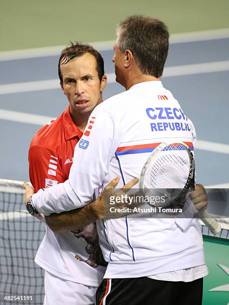 Radek Stepanek of Czech Republic hug with his coach after winning the match against Tatsuma Ito of Japan in a match between Japan v Czech Republic...