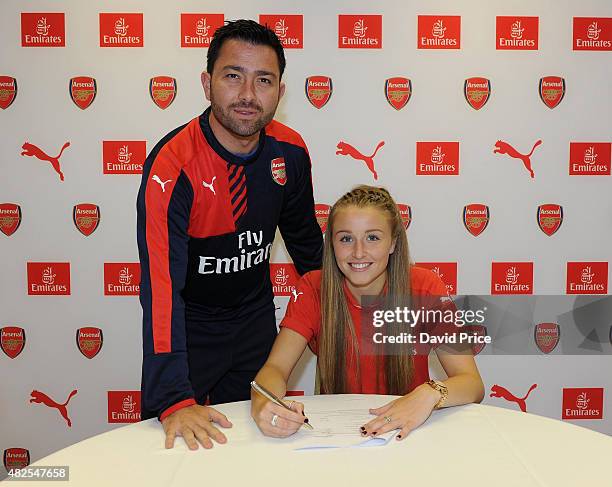 Leah Williamson signs a new long term contract with Arsenal Ladies with Arsenal Ladies Manager Pedro Martinez Losa at London Colney on July 30, 2015...