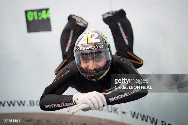 In this picture taken on April 3, 2014 an athlete from the Skydive Dubai team takes part in a training session ahead of the Bodyflight World...