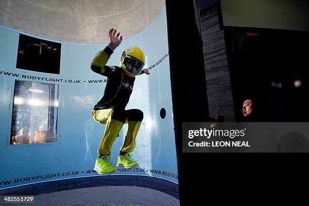 In this picture taken on April 3 eleven year old Kyra Poh from Singapore takes part in a training session ahead of the Bodyflight World Challenge,...