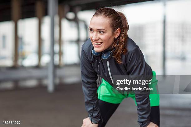 young happy woman catching her breath after sport - focus on sport 2013 stock pictures, royalty-free photos & images