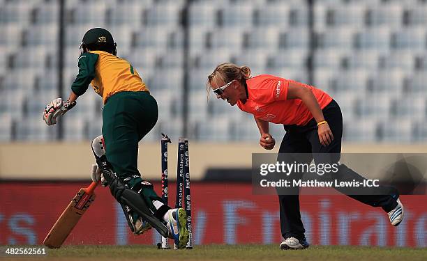 Marizanne Kapp of South Africa is run out by Charlotte Edwards of England, as Danielle Hazell looks on during the ICC World Twenty20 Bangladesh 2014...