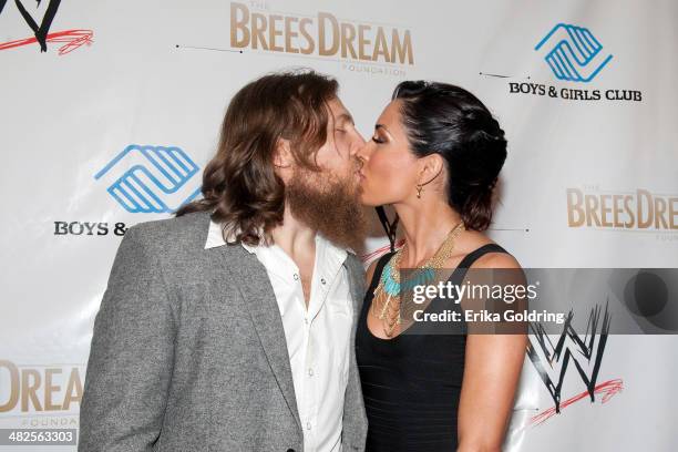 Bryan Danielson aka Daniel Bryan and Brie Bella attend WWE's 2014 SuperStars For Kids at the New Orleans Museum of Art on April 3, 2014 in New...