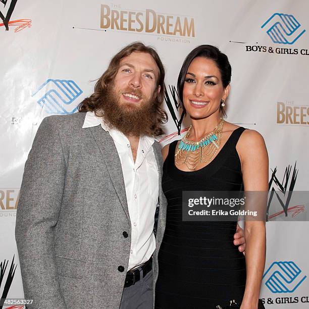 Bryan Danielson aka Daniel Bryan and Brie Bella attend WWE's 2014 SuperStars For Kids at the New Orleans Museum of Art on April 3, 2014 in New...