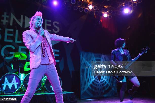 Jimmy Urine and Lyn-Z of Mindless Self Indulgence perform on stage at House Of Blues Chicago on April 3, 2014 in Chicago, United States.