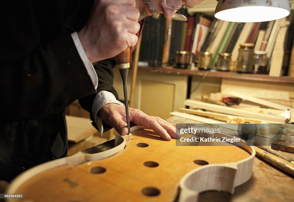 Violin maker at work