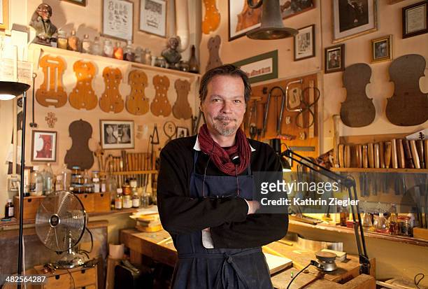 portrait of violin maker in his studio - three quarter length fotografías e imágenes de stock