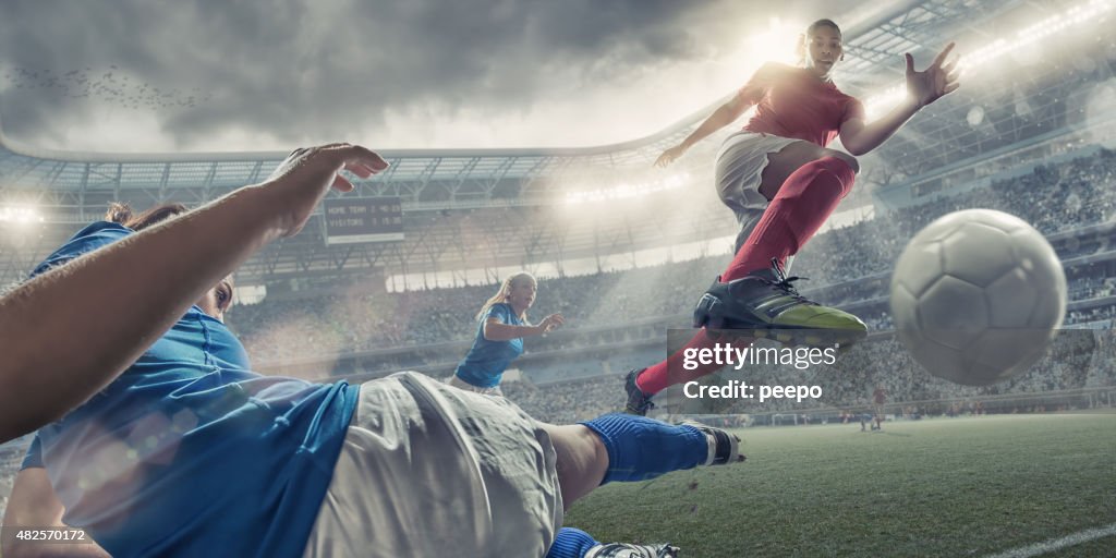 Women Soccer Players In Mid Air Action