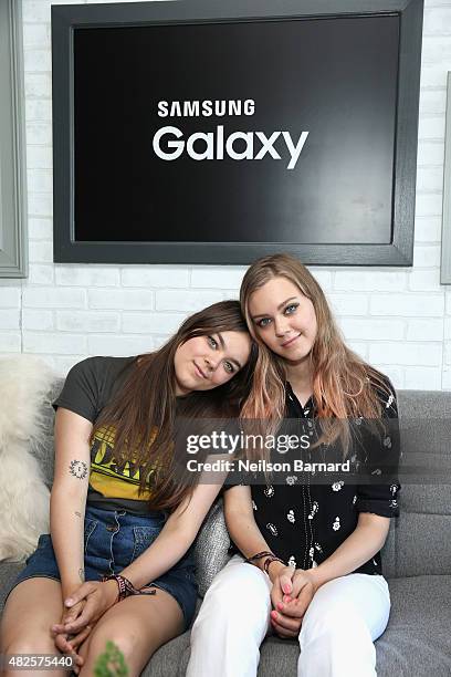 Klara Soderberg and Johanna Soderberg of First Aid Kit pose at the Samsung Galaxy Artist Lounge during Lollapalooza 2015 at Grant Park on July 31,...