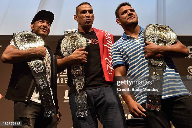 Featherweight Champion Jose Aldo, Heavyweight Champion Fabricio Werdum and Lightweight Champion Rafael dos Anjos of Brazil pose for photographers...