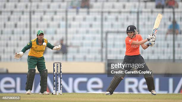 Charlotte Edwards of England bats during the ICC Womens World Twenty20 Bangladesh 2014 semi final between England and South Africa at Sher-e-Bangla...