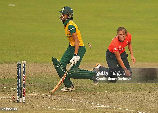 Natalie Sciver of England runs out Moseline Daniels of South Africa during the ICC Women's World Twenty20 Bangladesh 2014 2nd Semi-Final match...