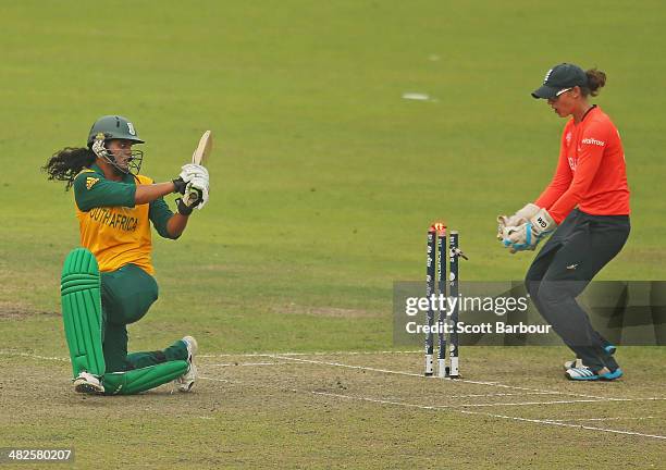 Chloe Tryon of South Africa is bowled out during the ICC Women's World Twenty20 Bangladesh 2014 2nd Semi-Final match between England Women and South...