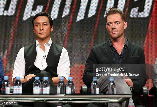 Executive producer/actor Daniel Wu and actor Marton Csokas speak onstage during the 'Into the Badlands' panel discussion at the AMC/IFC Networks...