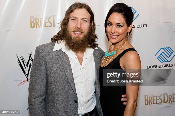 Daniel Bryan and Brie Bella attend WWE's 2014 SuperStars For Kids at the New Orleans Museum of Art on April 3, 2014 in New Orleans.