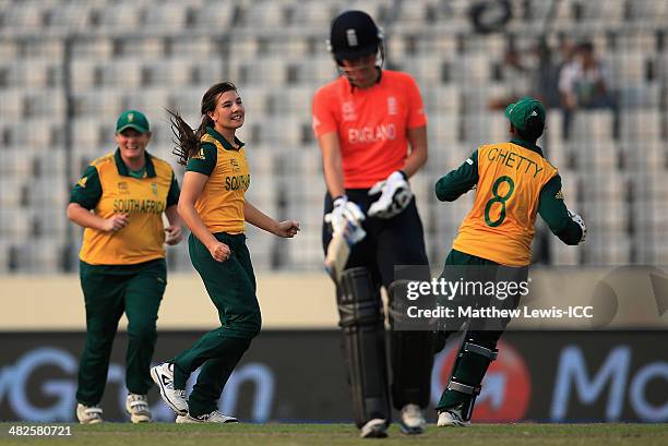 Sune Luus of South Africa celebrates catching Charlotte Edwards of England during the ICC World Twenty20 Bangladesh 2014 Womens Semi Final match...