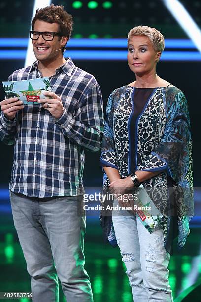 Hosts Daniel Hartwich and Sonja Zietlow attend the 1st live show of the television show 'Ich bin ein Star - lasst mich wieder rein!' on July 31, 2015...