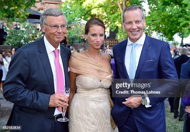 Wolfgang Bosbach , his dauther Caroline and Henry Maske attend the opening night of the Nibelungen festival on July 31, 2015 in Worms, Germany.