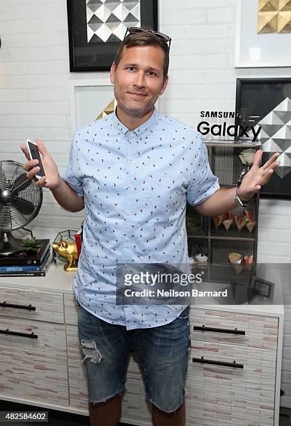 Kaskade poses at the Samsung Galaxy Artist Lounge during Lollapalooza 2015 at Grant Park on July 31, 2015 in Chicago, Illinois.