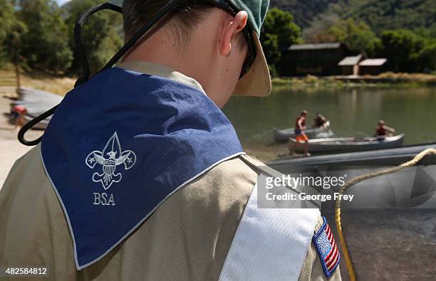 Boy Scout works on a canoe at camp Maple Dell on July 31, 2015 outside Payson, Utah. The Mormon Church is considering pulling out of its 102 year old...