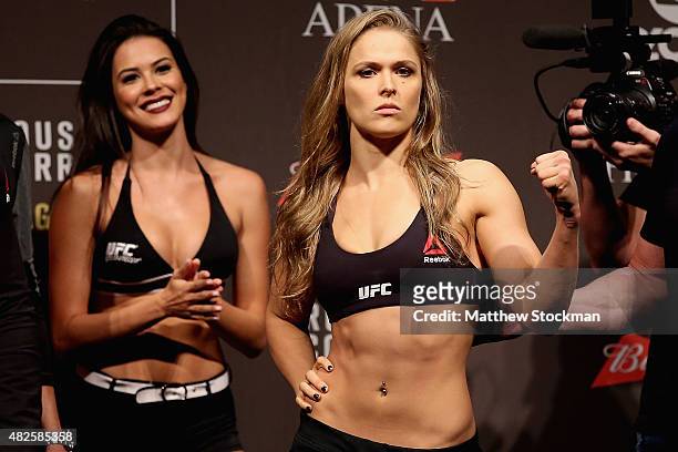Strawweight Champion Ronda Rousey of the United States poses for photographers during the UFC 190 Rousey v Correia weigh-in at HSBC Arena on July 31,...