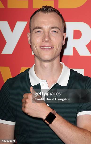 Skee poses with his watch at the FUSE Sunset Cocktail Party at The Beverly Hilton Hotel on July 31, 2015 in Beverly Hills, California.