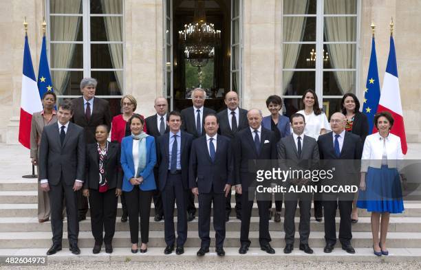 French President Francois Hollande poses with France's newly appointed Prime Minister Manuel Valls and members of the government Overseas Territories...