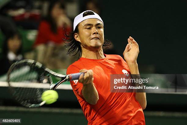 Taro Daniel of Japan in action against Lukas Rosol of Czech Republic in a match between Japan v Czech Republic during the Davis Cup world group...