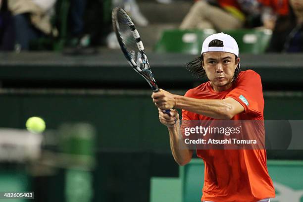 Taro Daniel of Japan in action against Lukas Rosol of Czech Republic in a match between Japan v Czech Republic during the Davis Cup world group...