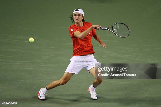 Taro Daniel of Japan in action against Lukas Rosol of Czech Republic in a match between Japan v Czech Republic during the Davis Cup world group...