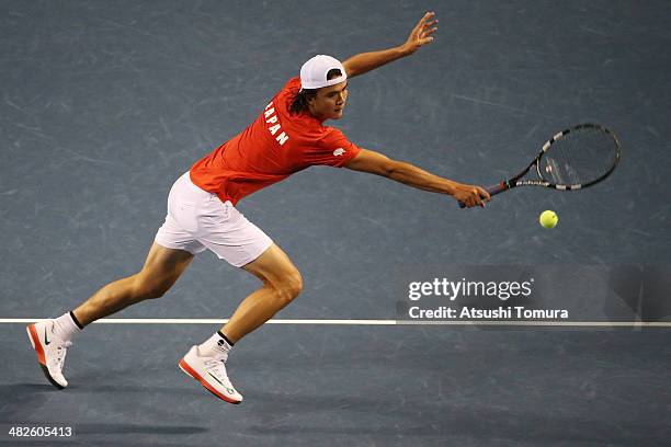 Taro Daniel of Japan in action against Lukas Rosol of Czech Republic in a match between Japan v Czech Republic during the Davis Cup world group...