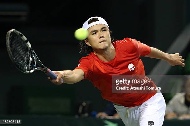 Taro Daniel of Japan in action against Lukas Rosol of Czech Republic in a match between Japan v Czech Republic during the Davis Cup world group...