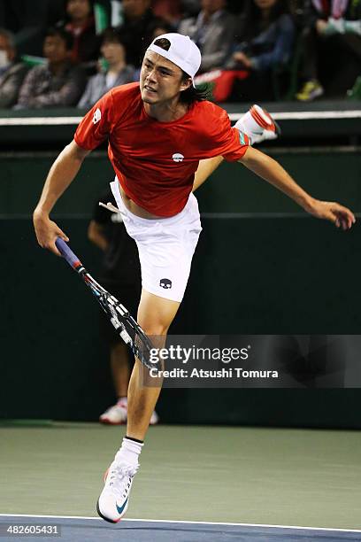 Taro Daniel of Japan serves against Lukas Rosol of Czech Republic in a match between Japan v Czech Republic during the Davis Cup world group...