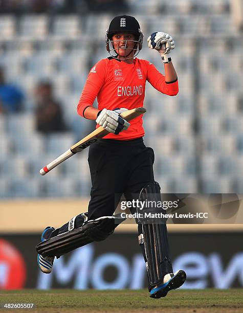 Sarah Taylor of England celebrates hitting the winning runs during the ICC World Twenty20 Bangladesh 2014 Womens Semi Final match between England...