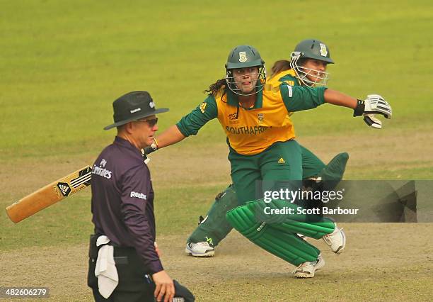 Chloe Tryon and Suné Luus of South Africa collide mid pitch as they run between the wickets as Suné Luus is run out during the ICC Women's World...