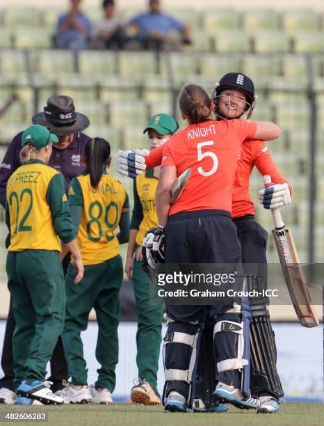 Sarah Taylor and Heather Knight of England embrace after hitting the winning runs during the England Women v South Africa Women at Sher-e-Bangla...