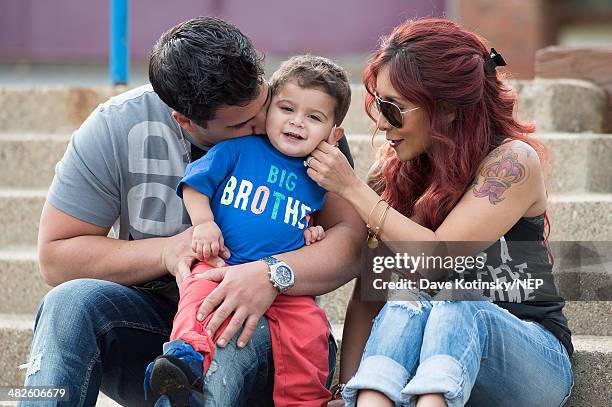 Nicole "Snooki" Polizzi and her fiance Jionni LaValle, pictured with their son Lorenzo LaValle on April 3, 2014 in New Jersey, are expecting their...