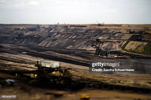 Steam bucket-wheel excavator extracts coal from the brown coal open cast mine Garzweiler in Immerath, western Germany. The small town Immerath and...