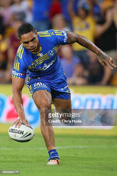 Willie Tonga of the Eels scores a breakaway try during the round five NRL match between the Brisbane Broncos and Parramatta Eels at Suncorp Stadium...
