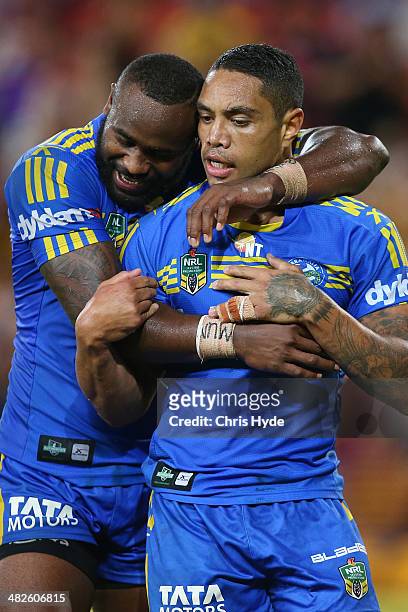 Willie Tonga of the Eels celebrates with team mate Semi Radradra after scoring a breakaway try during the round five NRL match between the Brisbane...