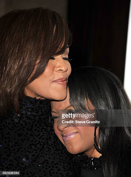 Whitney Houston and Bobbi Kristinaarrives Clive Davis And The Recording Academy's 2011 Pre-GRAMMY Gala at The Beverly Hilton hotel on February 12,...
