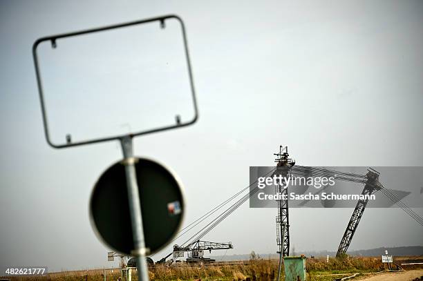 Bucket-wheel excavator extracts coal from the brown coal open cast mine Garzweiler on April 3, 2014 in Immerath, near Grevenbroich, Germany. The...