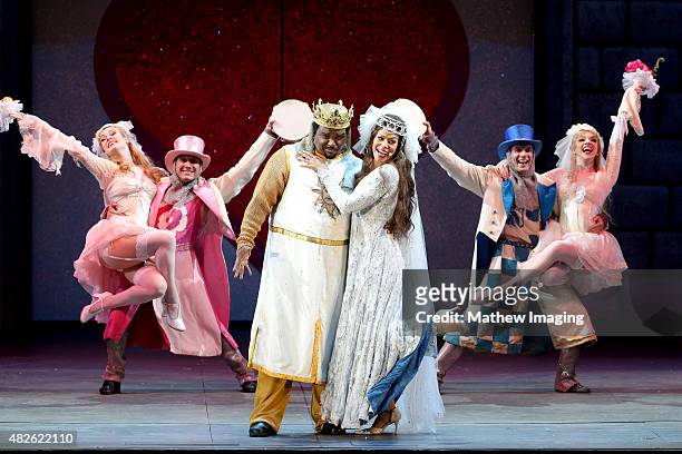 Actors Craig Robinson and Merle Dandridge perform onstage during Monty Python Spamalot at the Hollywood Bowl on July 31, 2015 in Hollywood,...