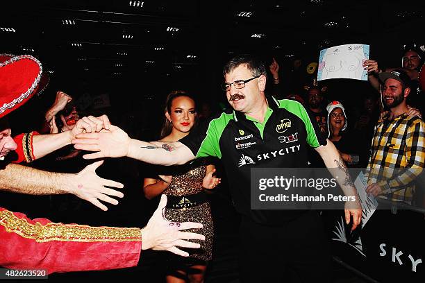 Warren Parry is welcomed by fans ahead of the Super League Darts Final between Warren Parry and Craig Caldwell at Sky City on August 1, 2015 in...