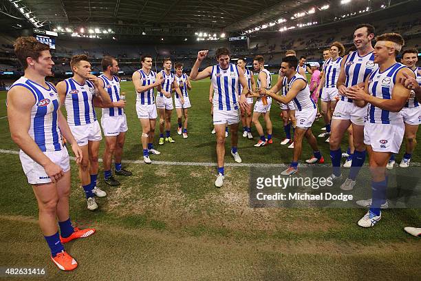 Jarrad Waite of the Kangaroos celebrates the win in his 200th game during the round 18 AFL match between the Carlton Blues and the North Melbourne...