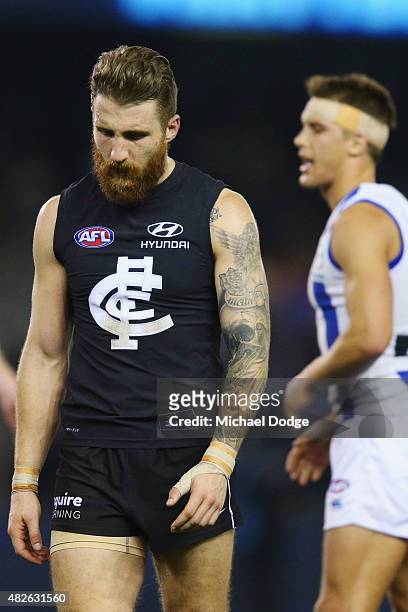 Zach Tuohy of the Blues reacts after defeat during the round 18 AFL match between the Carlton Blues and the North Melbourne Kangaroos at Etihad...