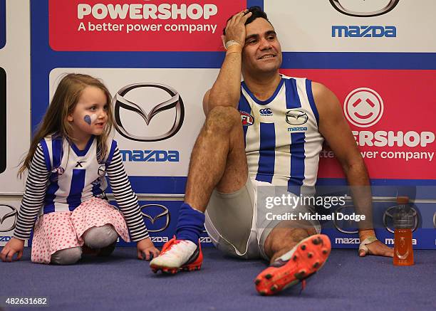 Lindsay Thomas of the Kangaroos relaxes in the rooms after his win during the round 18 AFL match between the Carlton Blues and the North Melbourne...