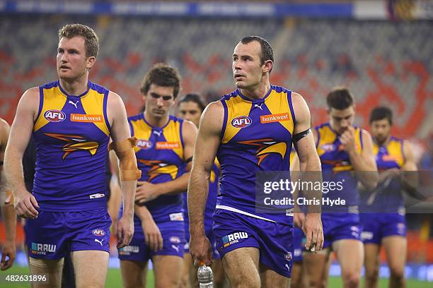 Eagles leave the field after a draw during the round 18 AFL match between the Gold Coast Suns and the West Coast Eagles at Metricon Stadium on August...