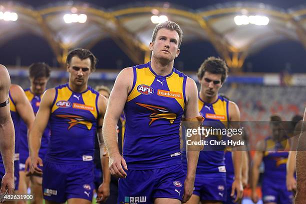 Eagles leave the field after a draw during the round 18 AFL match between the Gold Coast Suns and the West Coast Eagles at Metricon Stadium on August...